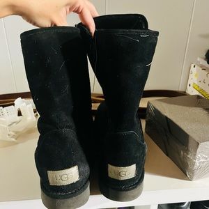Ugg Boot in black with a zipper size 8 from smoke free home